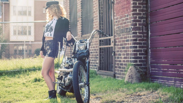 Woman motorcycle brick wall purple free wallpaper for desktop - medium preview image