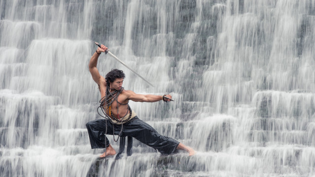 Man waterfall sword action painting free wallpaper for desktop - medium preview image