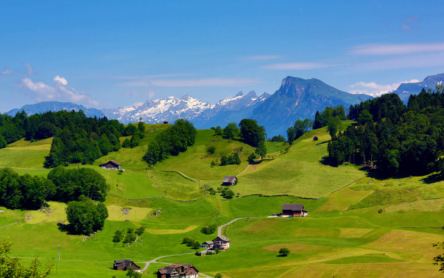 Green valley mountains houses bushes free wallpaper for desktop - medium preview image
