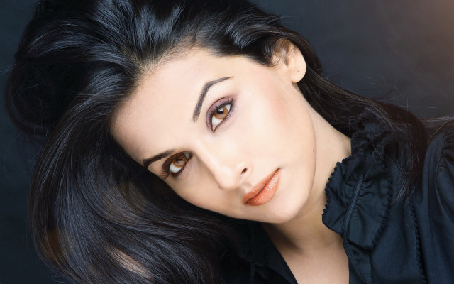 Woman longhair blackshirt posing wind free wallpaper for desktop - medium preview image