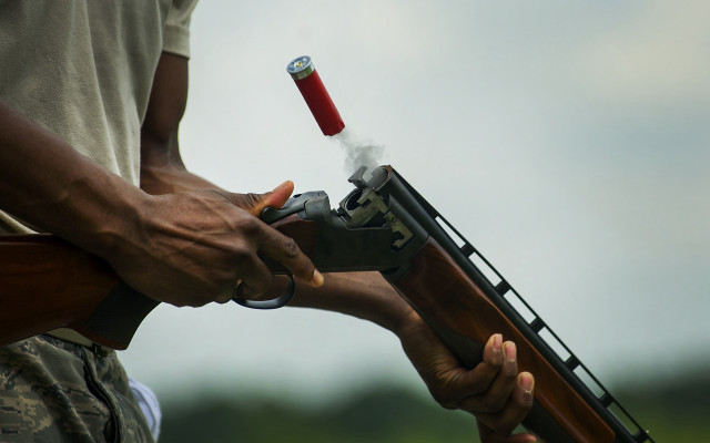 Man gun red handle headshot free wallpaper for desktop - medium preview image