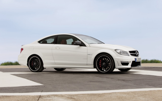 White car parking lot grass free wallpaper for desktop - medium preview image