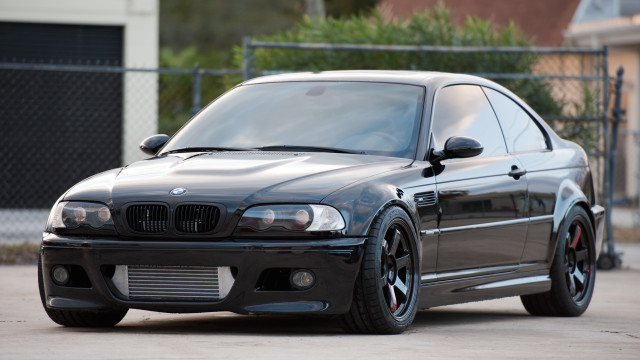 Black car chainlink fence building free wallpaper for desktop - medium preview image