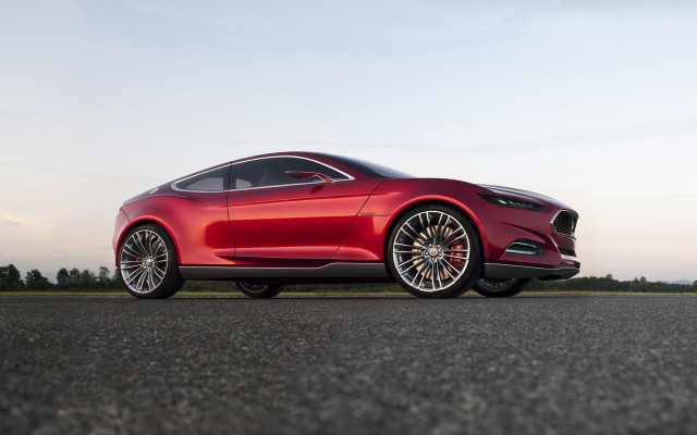 Red sports car evening sunshine free wallpaper for desktop - medium preview image