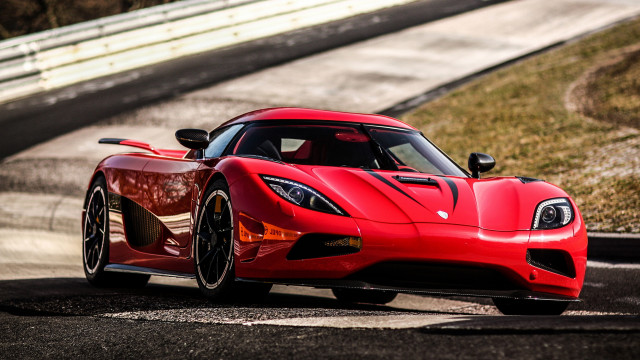 Red sports car race track free wallpaper for desktop - medium preview image