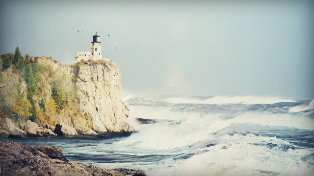 Lighthouse cliff waves birds sunny free wallpaper for desktop - medium preview image