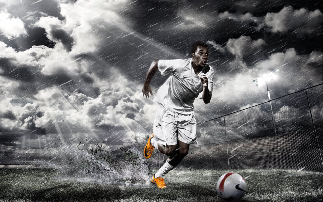 Man kicking soccer rain cloudy free wallpaper for desktop - medium preview image