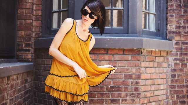 Woman yellow dress banana phone free wallpaper for desktop - medium preview image