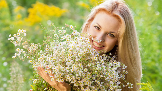 Woman flower bouquet smiling outdoors free wallpaper for desktop - medium preview image