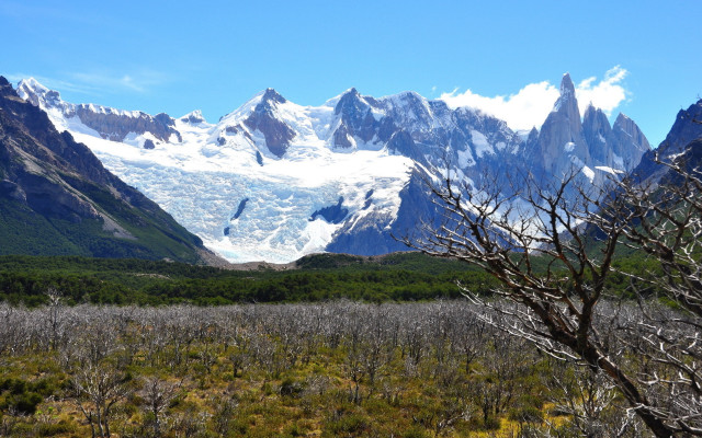 Mountain range snow capped field free wallpaper for desktop - medium preview image