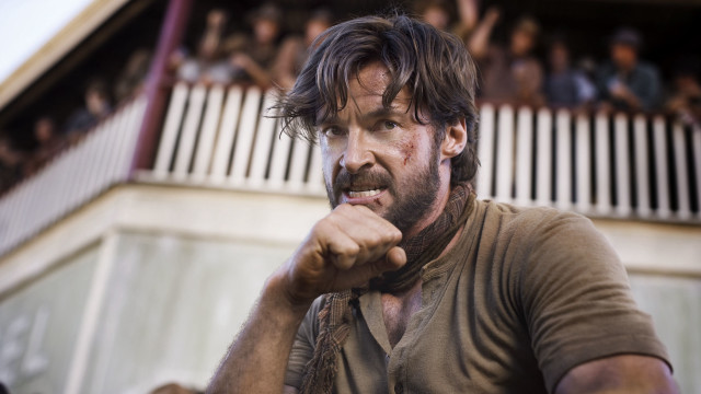 Bearded man city stadium photorealistic free wallpaper for desktop - medium preview image