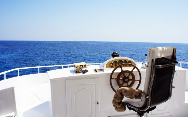 Steering wheel boat ocean deck free wallpaper for desktop - medium preview image