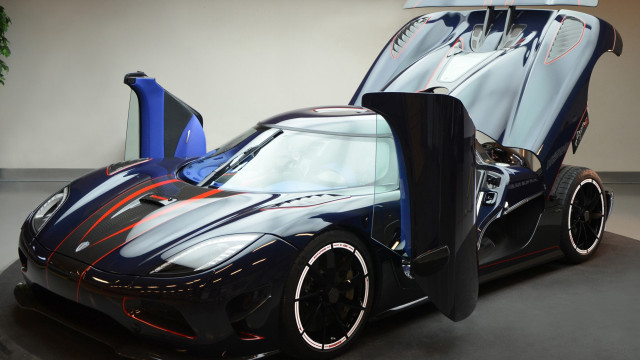 Black sports car open door free wallpaper for desktop - medium preview image