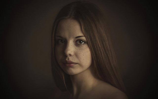 Freckled woman serious portrait artist free wallpaper for desktop - medium preview image