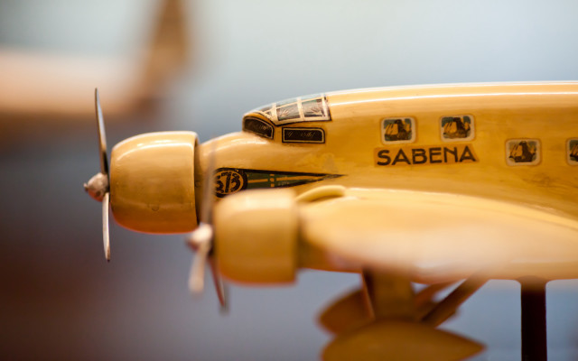 Yellow plane tiltshift shallowdepth blurry free wallpaper for desktop - medium preview image