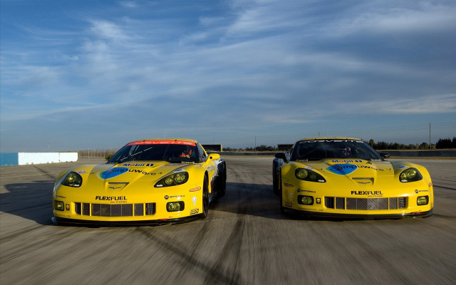 Yellow sports cars ocean track free wallpaper for desktop - medium preview image