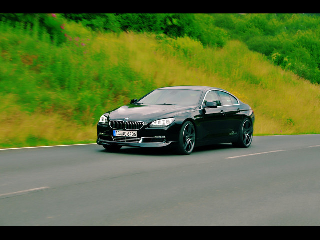 Black car road green hillside free wallpaper for desktop - medium preview image