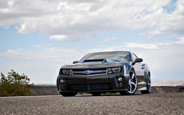 Black car hill trees clouds free wallpaper for desktop - medium preview image