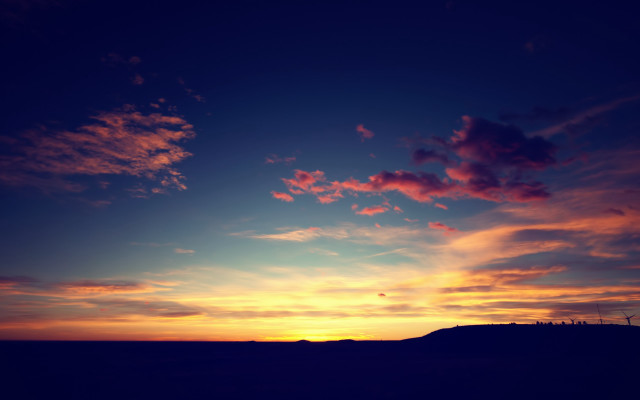 Sunset hills clouds mountain ocean free wallpaper for desktop - medium preview image
