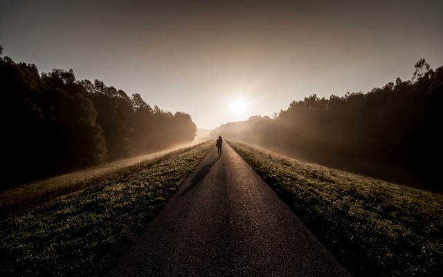 Person walking road field sunset free wallpaper for desktop - medium preview image