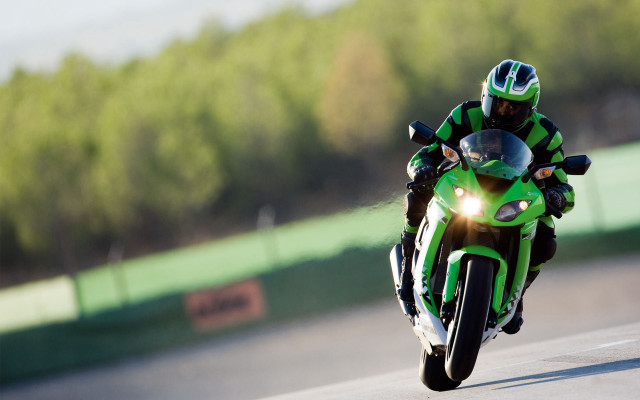 Motorcycle rider green track forest free wallpaper for desktop - medium preview image