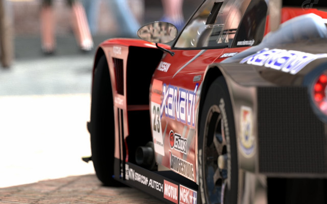 Red race car number blurry free wallpaper for desktop - medium preview image