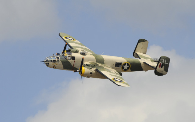 Small plane cloudy sky propeller free wallpaper for desktop - medium preview image