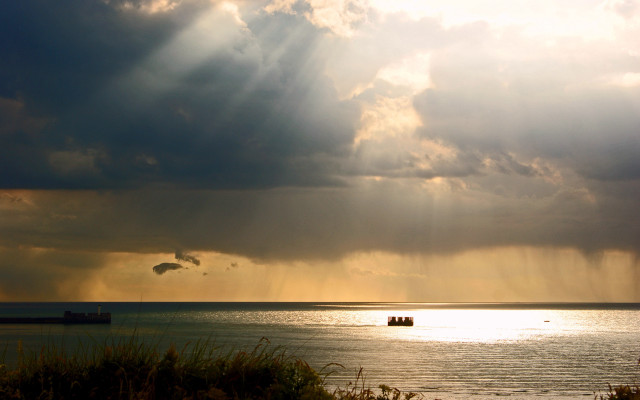 Boat sunset mountain ocean godrays free wallpaper for desktop - medium preview image