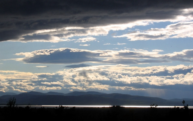 Stormy water mountains cloudy sky free wallpaper for desktop - medium preview image