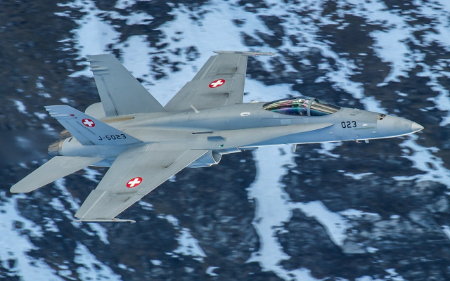 Fighterjet snowmountain redcross backlit vienneseactionism free wallpaper for desktop - medium preview image