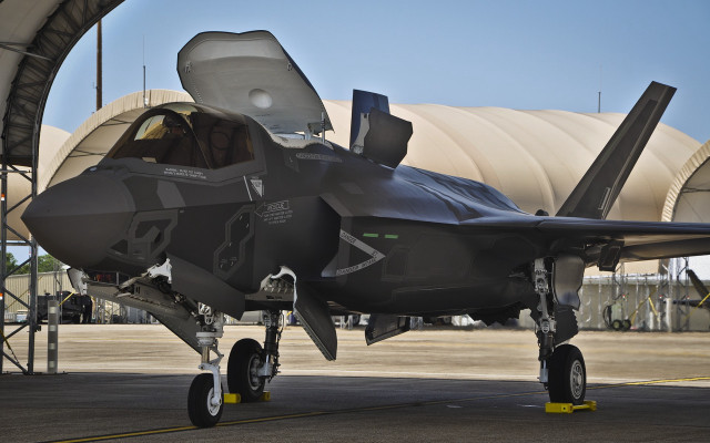 Jet fighter airport tarmac hangar free wallpaper for desktop - medium preview image