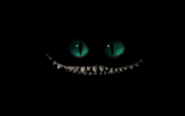 Black background green eyes smile #2 free wallpaper for desktop - medium preview image