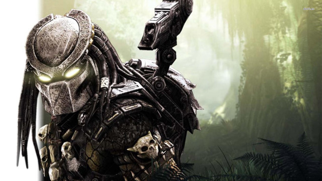 Predator with gun in forest free wallpaper for desktop - medium preview image
