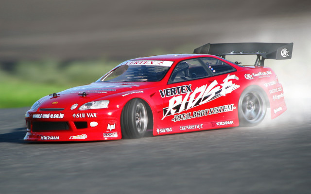 Red car smoke bomb track free wallpaper for desktop - medium preview image