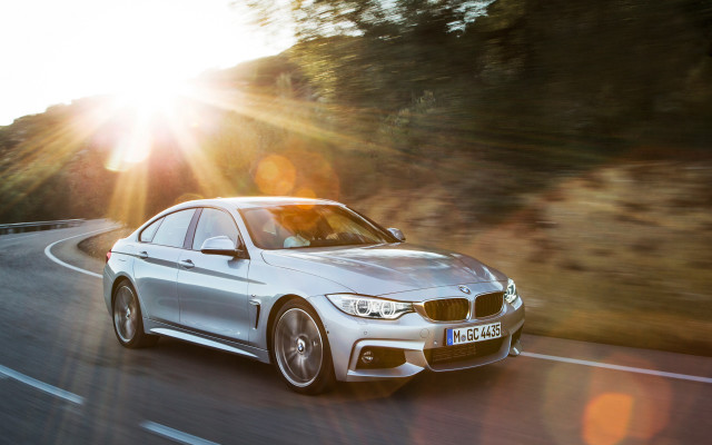 Silver car forest hillside sunlight free wallpaper for desktop - medium preview image