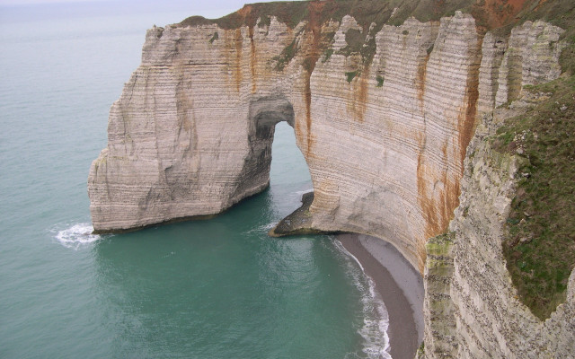 Large rock formation boat cliff free wallpaper for desktop - medium preview image