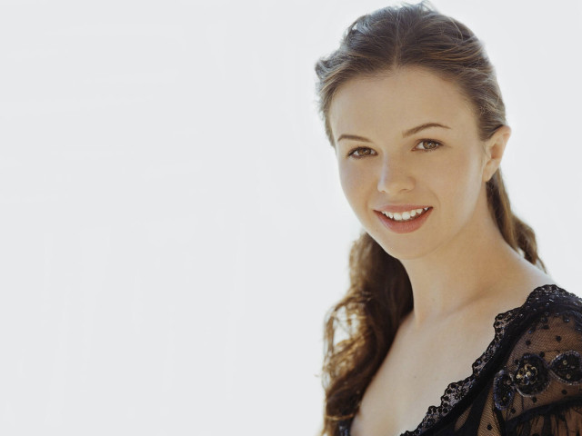 Smiling woman black dress white free wallpaper for desktop - medium preview image