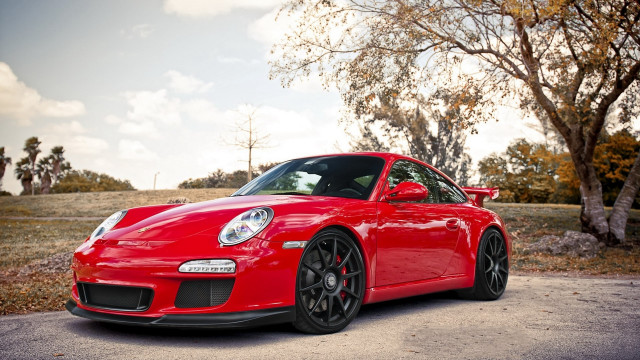 Red sports car autumn leaves #2 free wallpaper for desktop - medium preview image