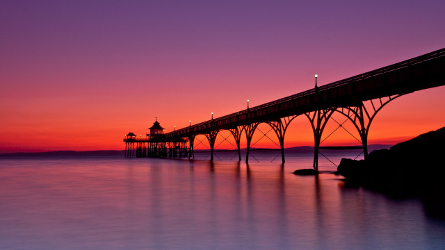 Pier sunset purple sky reflection free wallpaper for desktop - medium preview image