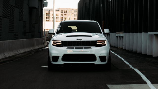 White jeep parking lot building free wallpaper for desktop - medium preview image