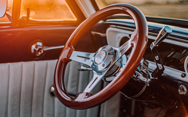 Car dashboard steering wheel sunbeam free wallpaper for desktop - medium preview image