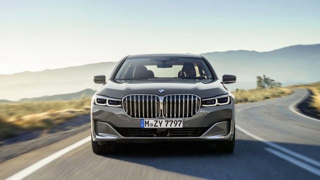 Silver car mountains sky road free wallpaper for desktop - medium preview image