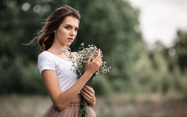Woman flowers serious portrait bokeh #2 free wallpaper for desktop - medium preview image