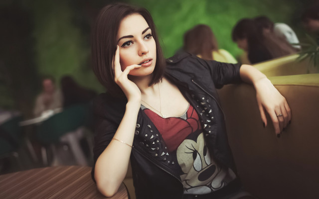 Serious woman portrait blurry background free wallpaper for desktop - medium preview image