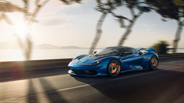 Blue sports car ocean road free wallpaper for desktop - medium preview image