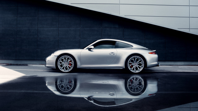 Silver sports car reflection pavement free wallpaper for desktop - medium preview image