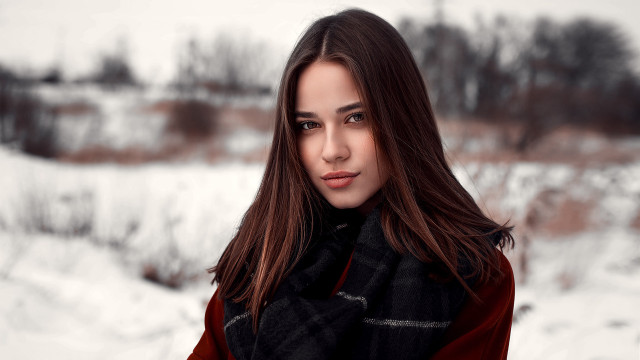 Woman snow red coat blurry #2 free wallpaper for desktop - medium preview image
