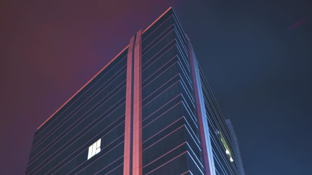 Tall building large window night free wallpaper for desktop - medium preview image