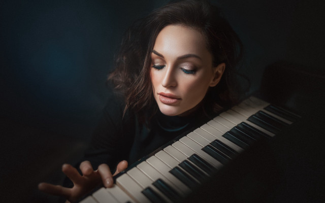 Piano playing woman dark studio free wallpaper for desktop - medium preview image
