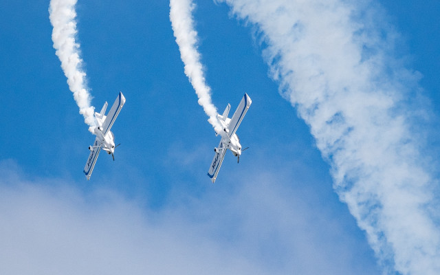 Two airplanes smoke trail precisionism free wallpaper for desktop - medium preview image